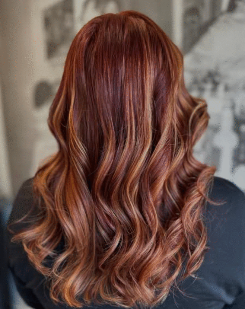 Red Curly Hair by Lotus Hair Design in St. Albert